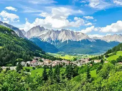 Scenic landscape of Escaldes-Engordany with mountains and greenery.