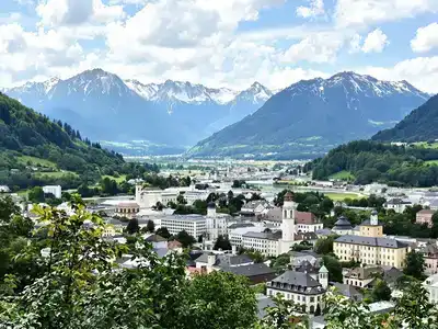  Salzburg skyline with mountains and historic architecture.