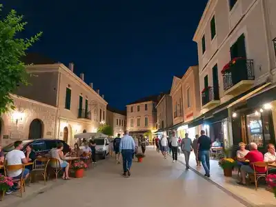 Vibrant street scene of Šibenik, Croatia with nightlife.