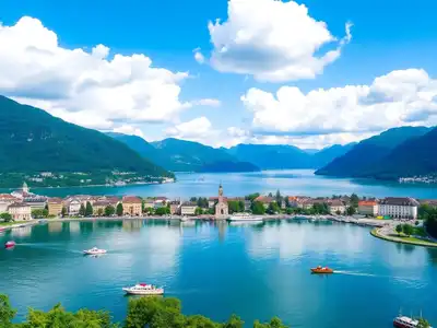 Beautiful Zurich lake with mountains and colorful boats.