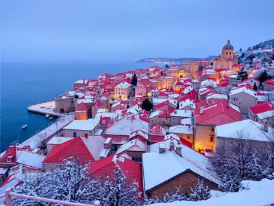 Winter view of Dubrovnik’s historic city and snow.