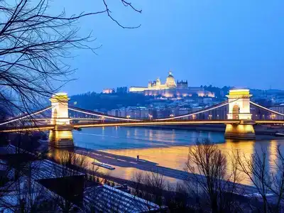 Winter scene of Budapest with snow and lights.