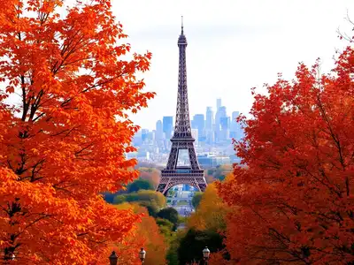 Eiffel Tower surrounded by colorful autumn leaves in Paris.