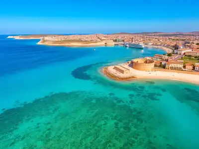 Aerial view of Malta’s coastline and historic architecture.