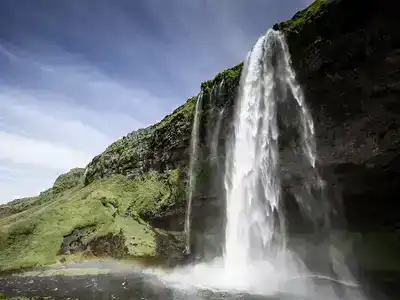 Seljalandsfoss in Iceland under a cloudy sky