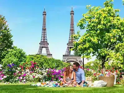  Couple having a picnic near the Eiffel Tower.