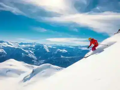 Expert skier on challenging terrain in the French Alps.