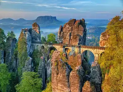  The Bastei Bridge with moss covered rock formation.