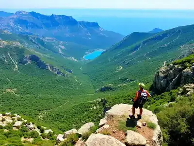 Hiker overlooking a scenic Greek landscape with mountains.