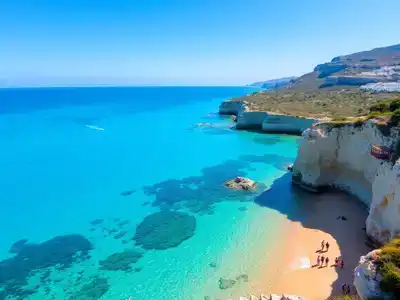 Families enjoying a sunny day at Milos beach.