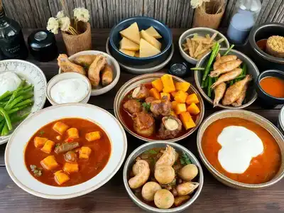 Array of traditional Icelandic dishes on a wooden table.