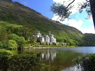 Ireland Castle in front of a calm lake.