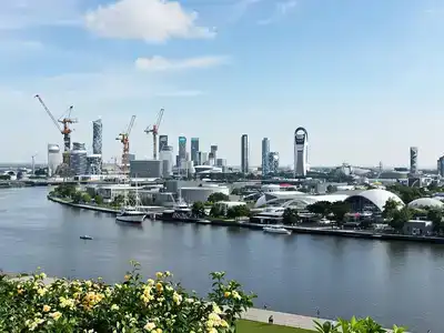 Rotterdam skyline with people enjoying outdoor activities.