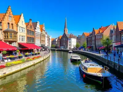 Canal view in Utrecht with historic buildings and boats.