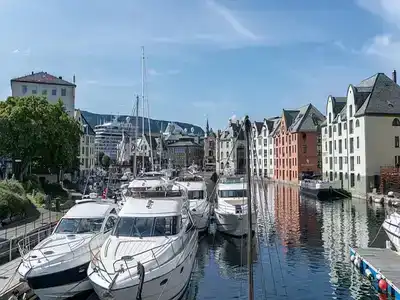 Boats moored at a marina in Ålesund