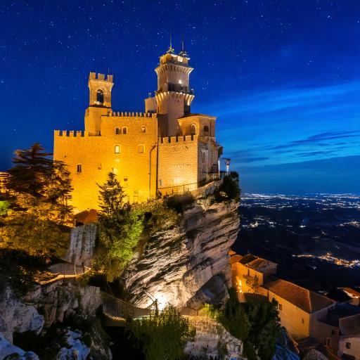 San Marino’s stunning architecture, illuminated beautifully against the night sky