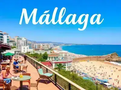 Málaga coastline with couples and families enjoying outdoors.