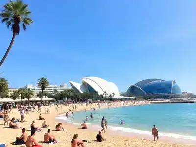 Coastal view of Valencia’s modern architecture and beach.