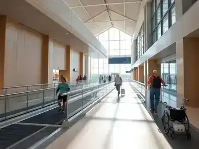 Modern airport terminal in Spain with accessibility features.