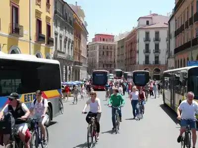 Colorful street scene in Spain with diverse transportation options.