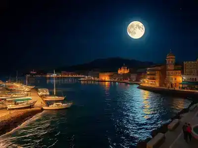 Happy couple walking beneath Antalya moonlit sky along lively waterfront.