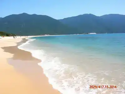 Family enjoying a peaceful beach day in Akyaka, Turkey.