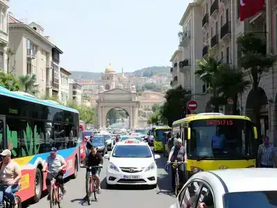 Colorful street scene with various transportation options in Turkey.