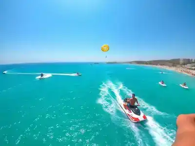 People enjoying water sports in Turkey's beautiful coastline.