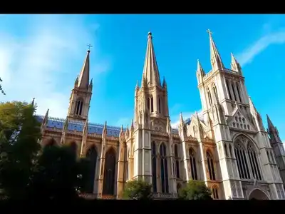 Westminster Abbey’s Gothic architecture under a clear blue sky.