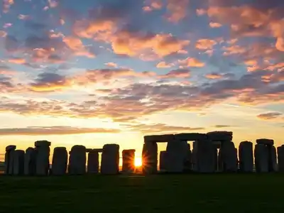 Stonehenge at sunset with dramatic skies and greenery.